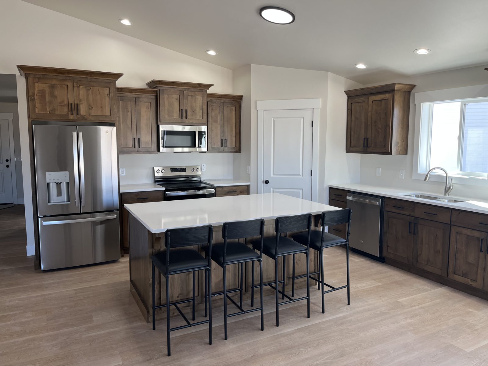 Kitchen island with seating in the Summit home in Chubbuck, Idaho