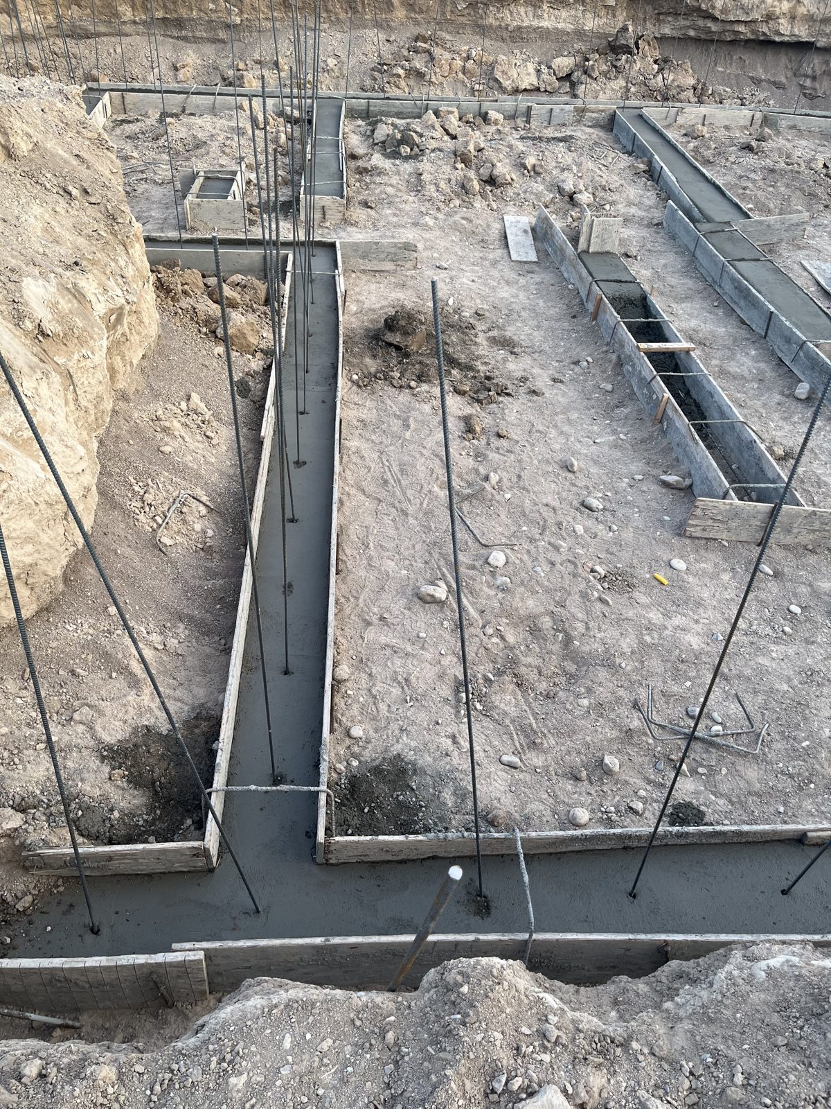 Footings with rebar for the Summit home foundation