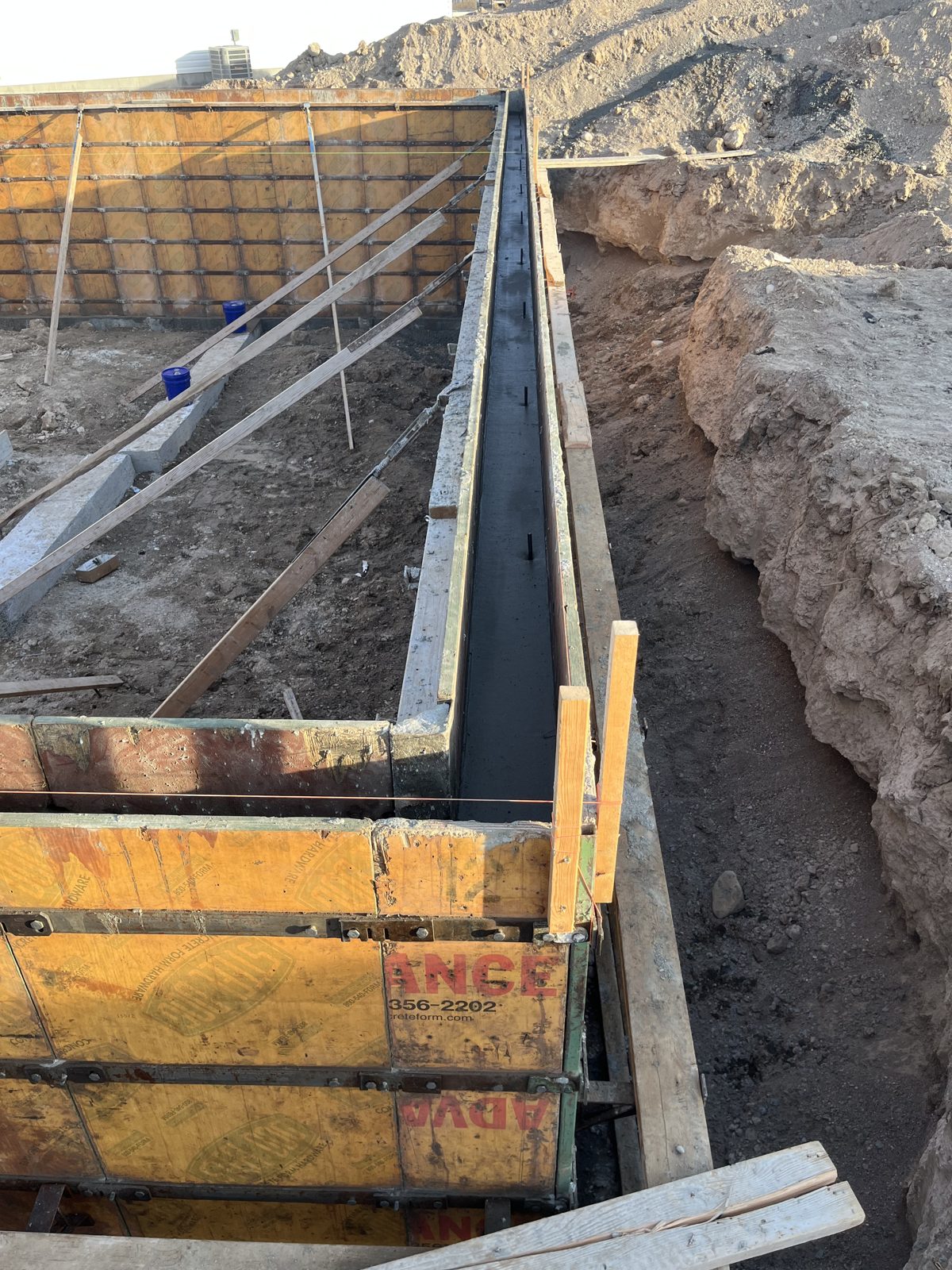 Foundation wall forms going up for the Summit home
