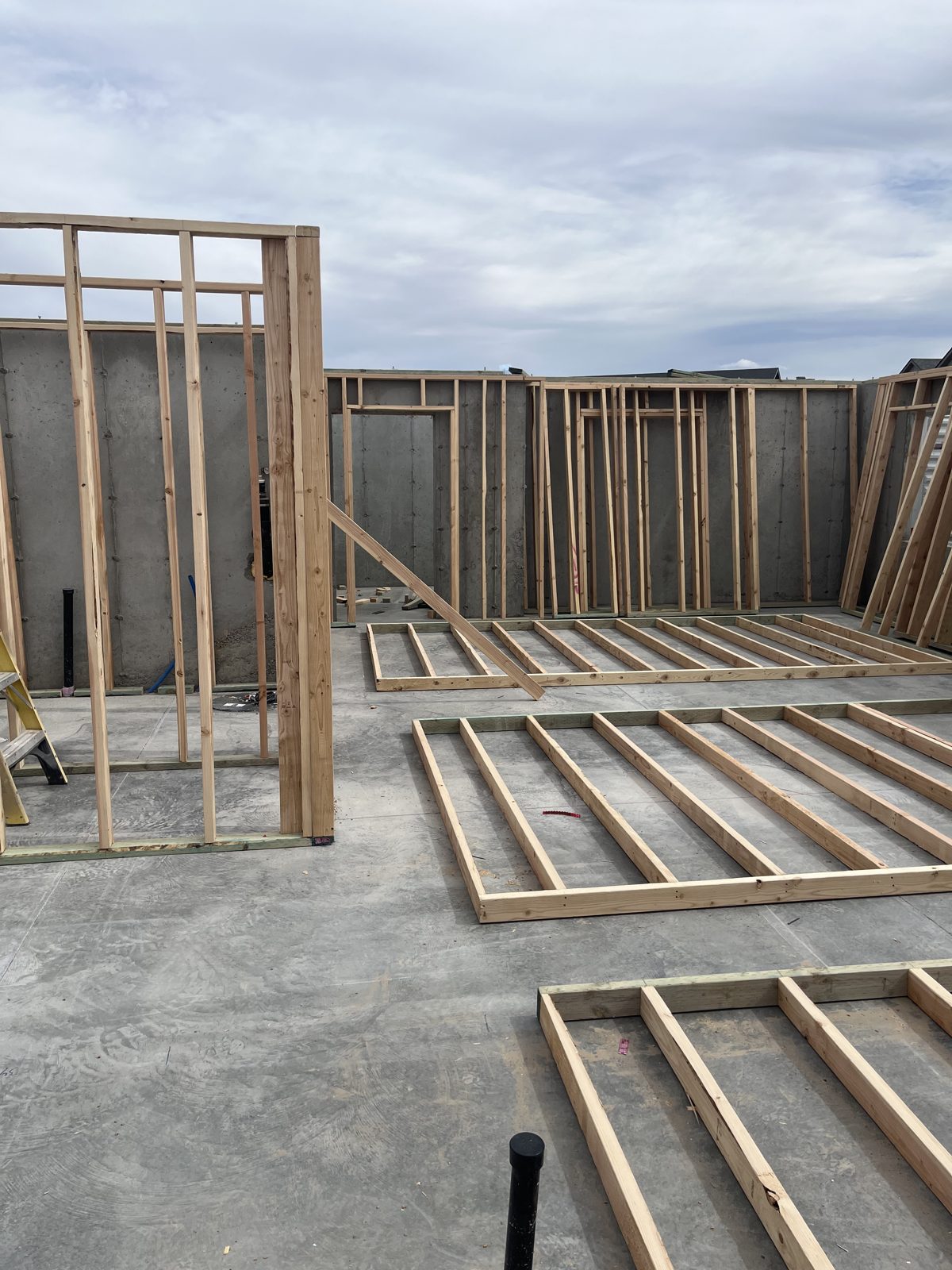 Wall framing laid out on the subfloor at the Summit home