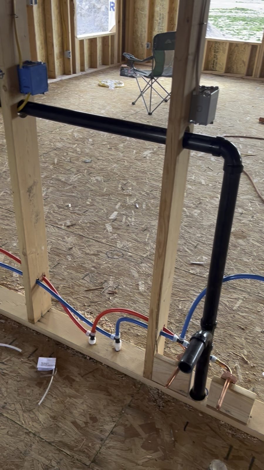 Plumbing rough-in with PEX lines at the Summit home