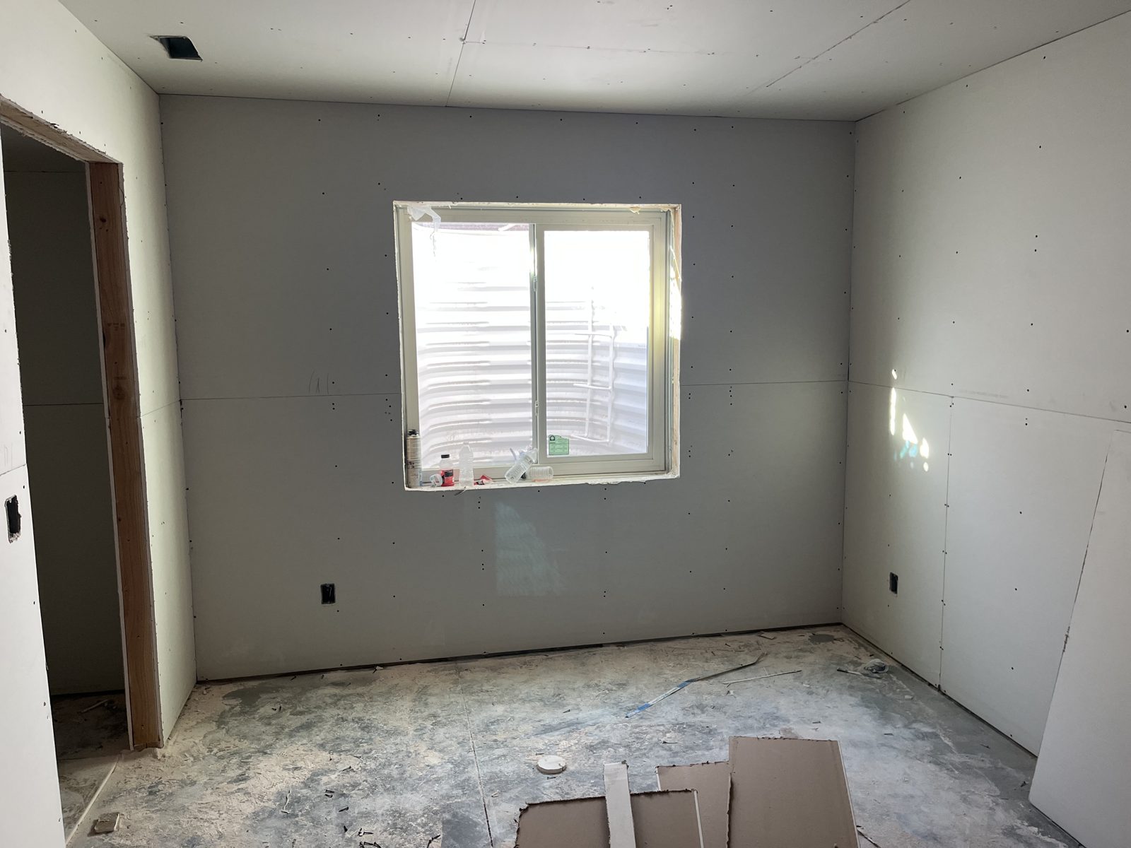Summit home basement bedroom at the drywall stage