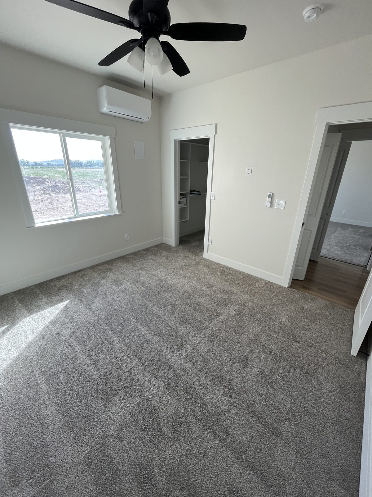 Bedroom in the office space of the Western Legacy Homes RV garage and shop