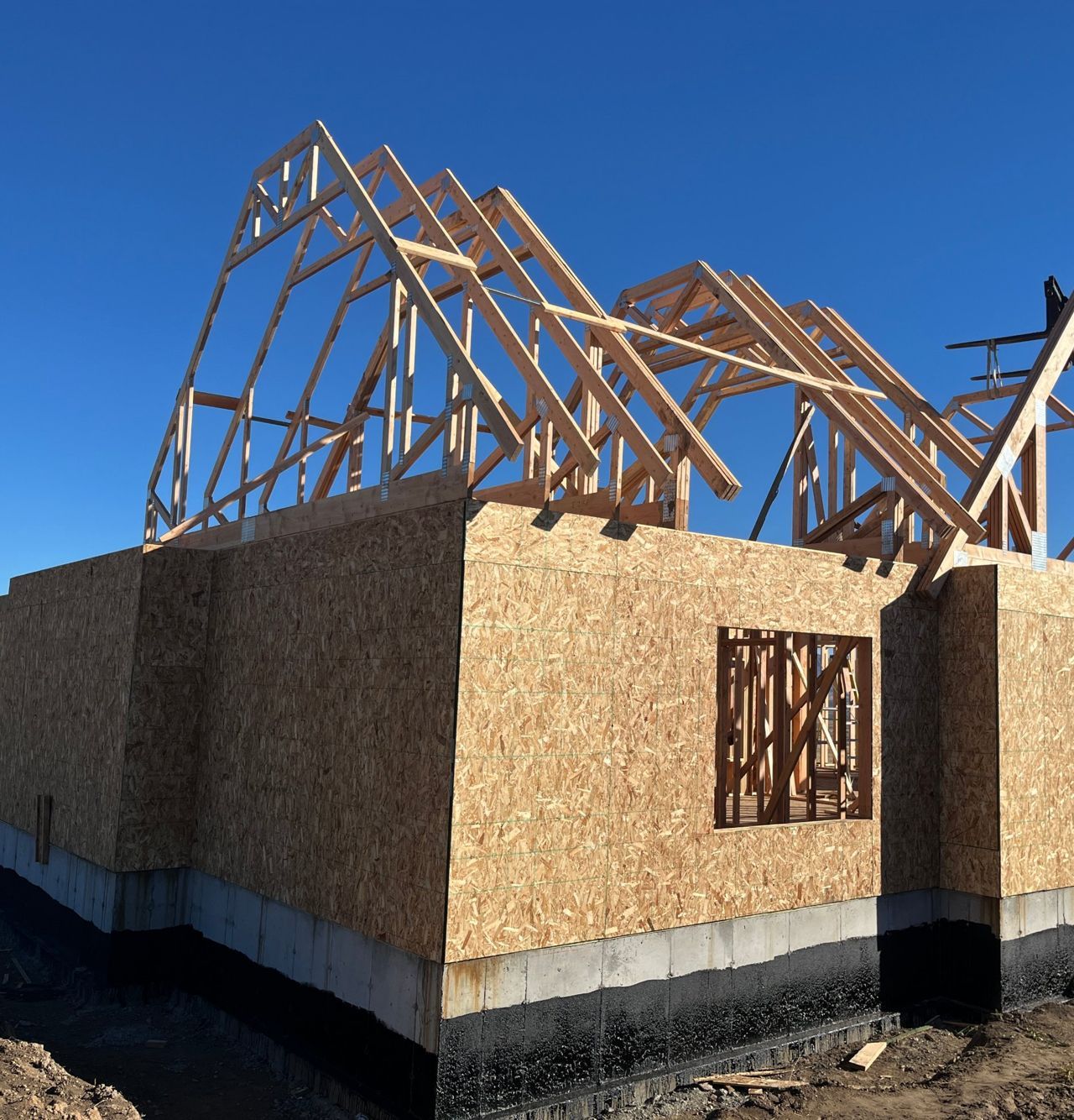 Roof trusses being set on a Western Legacy Homes build